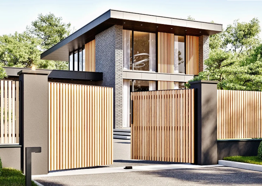 Portail coulissant lames bois clair et piliers anthracite devant villa contemporaine
